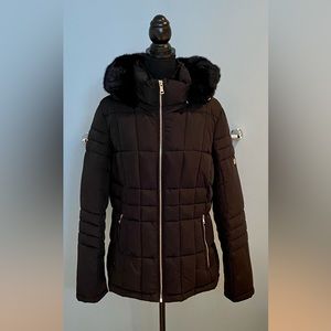 Women’s Calvin Klein black puffer coat.
